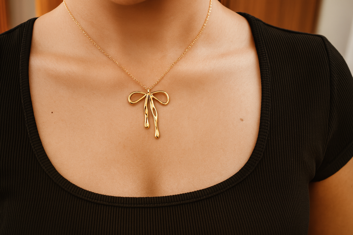 Stainless steel 18k gold bow necklace