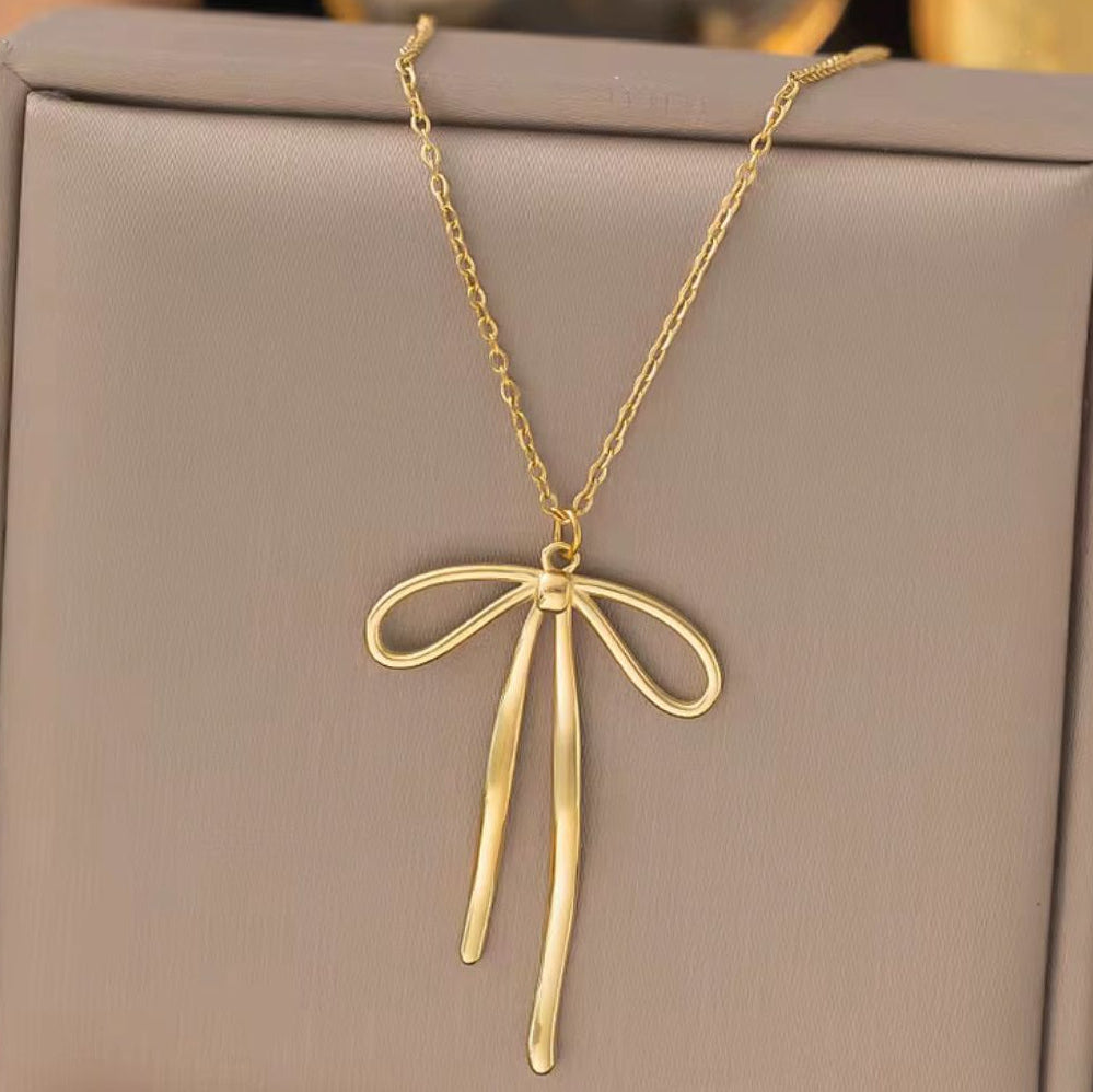 Stainless steel 18k gold bow necklace