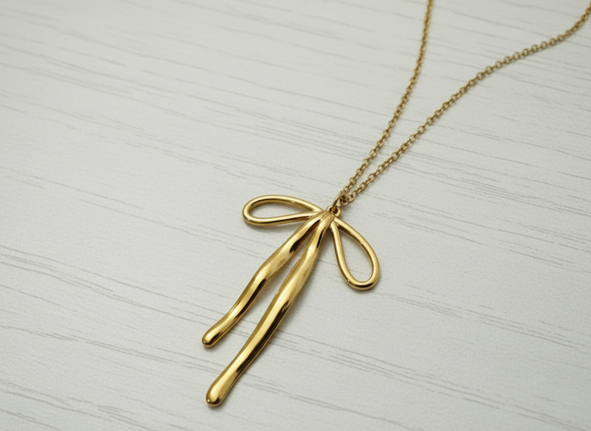 Stainless steel 18k gold bow necklace
